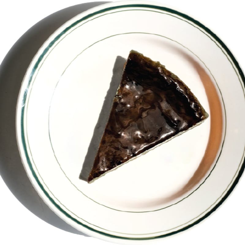 Slice of Matcha Basque Cheesecake